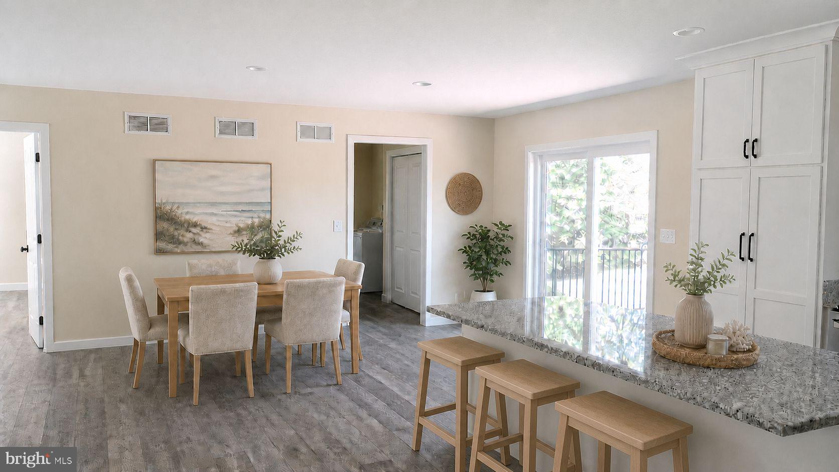 130 Soule Road New Bloomfield, PA 17068 - Photo 3 of 18 a view of a dining room with furniture and wooden floor