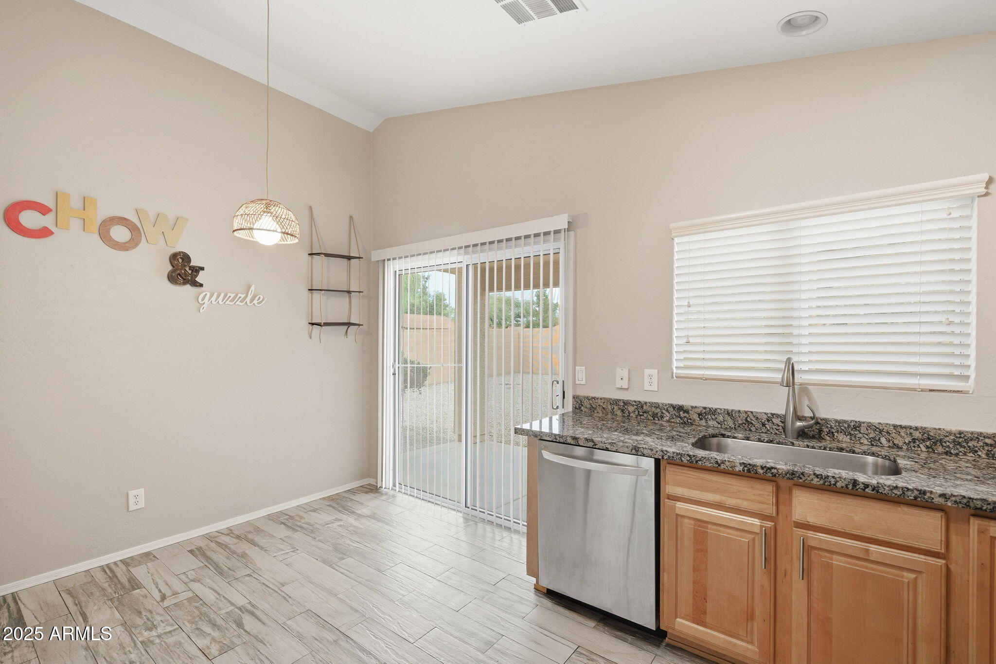 227 South 16th Street Coolidge, AZ 85128 - Photo 15 of 34 a kitchen with granite countertop a sink and a granite counter tops