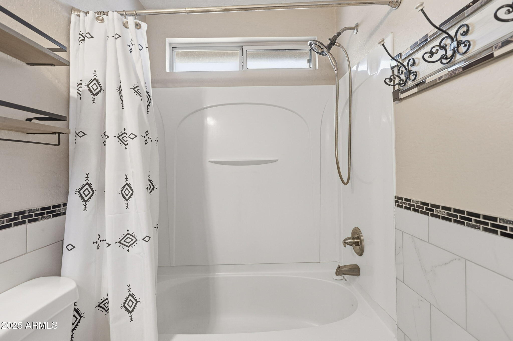 227 South 16th Street Coolidge, AZ 85128 - Photo 17 of 34 a bathroom with a shower a toilet and a shower