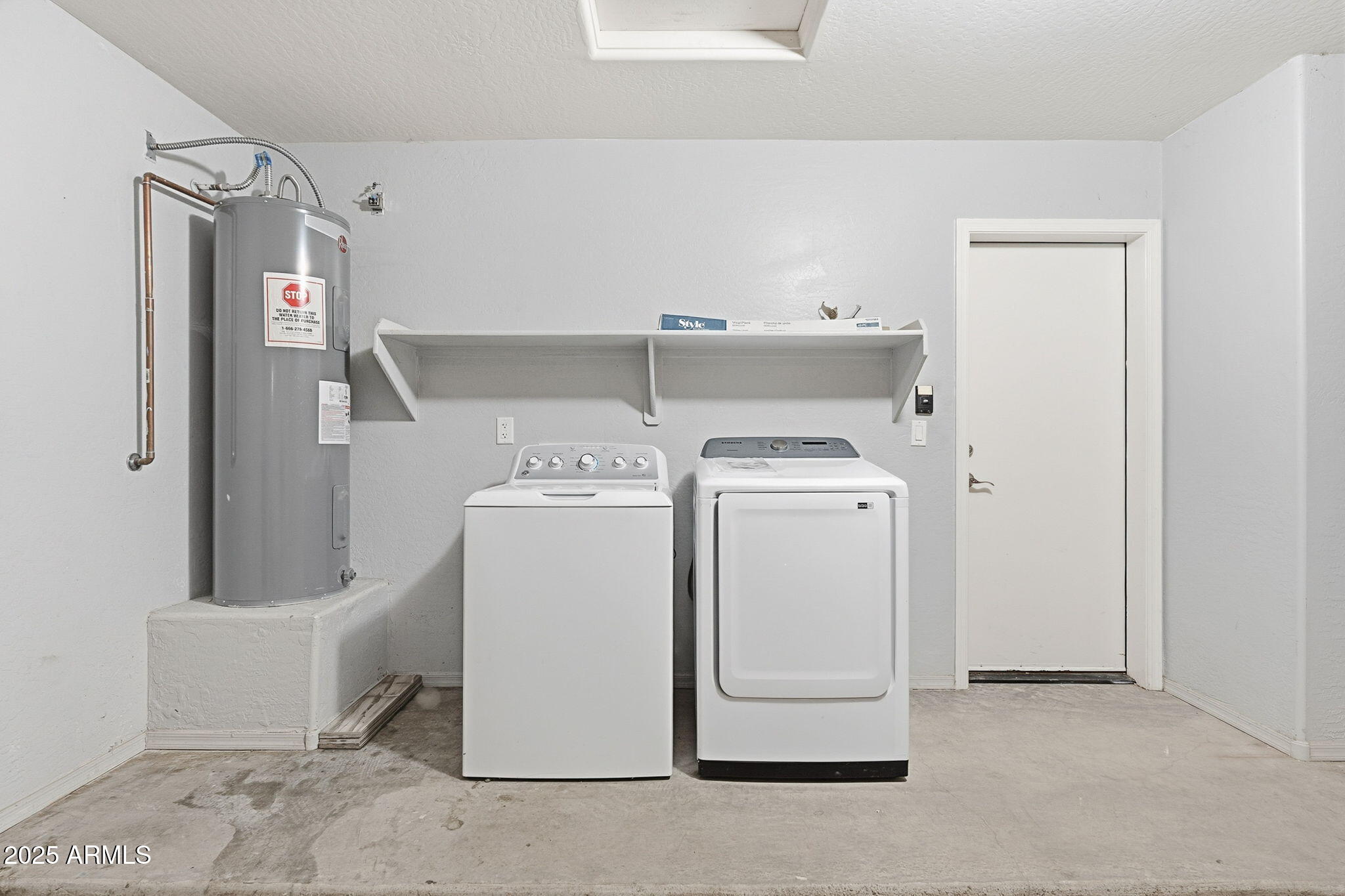 227 South 16th Street Coolidge, AZ 85128 - Photo 27 of 34 a utility room with dryer and washer
