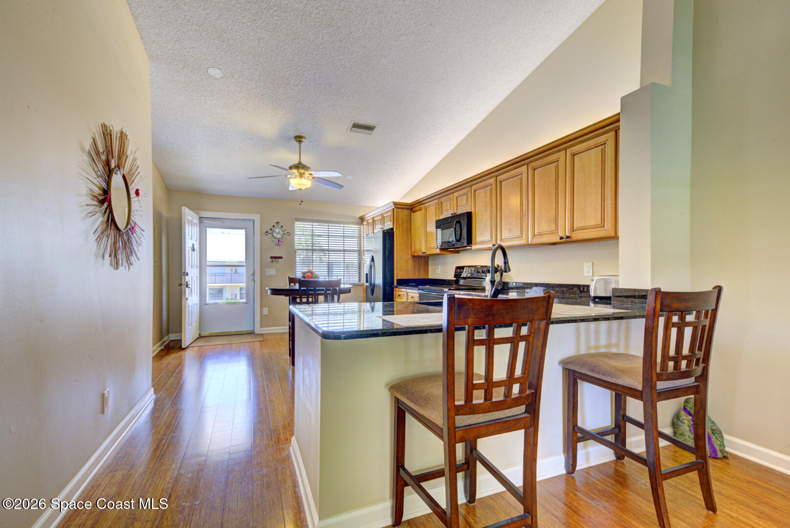 1142 Keystone Drive, Unit F Jupiter, FL 33458 - Photo 11 of 43 kitchen breakfast bar