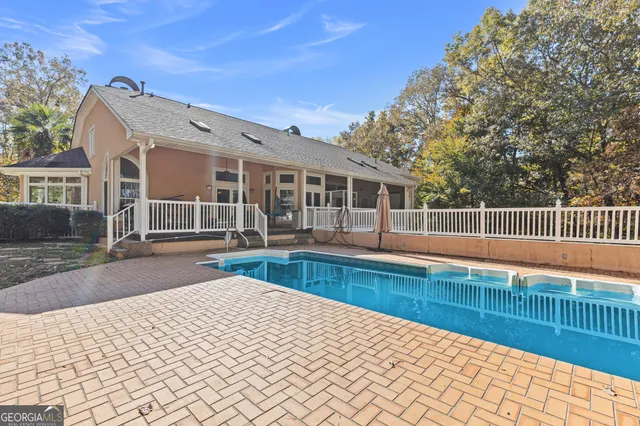 a view of a city with green field