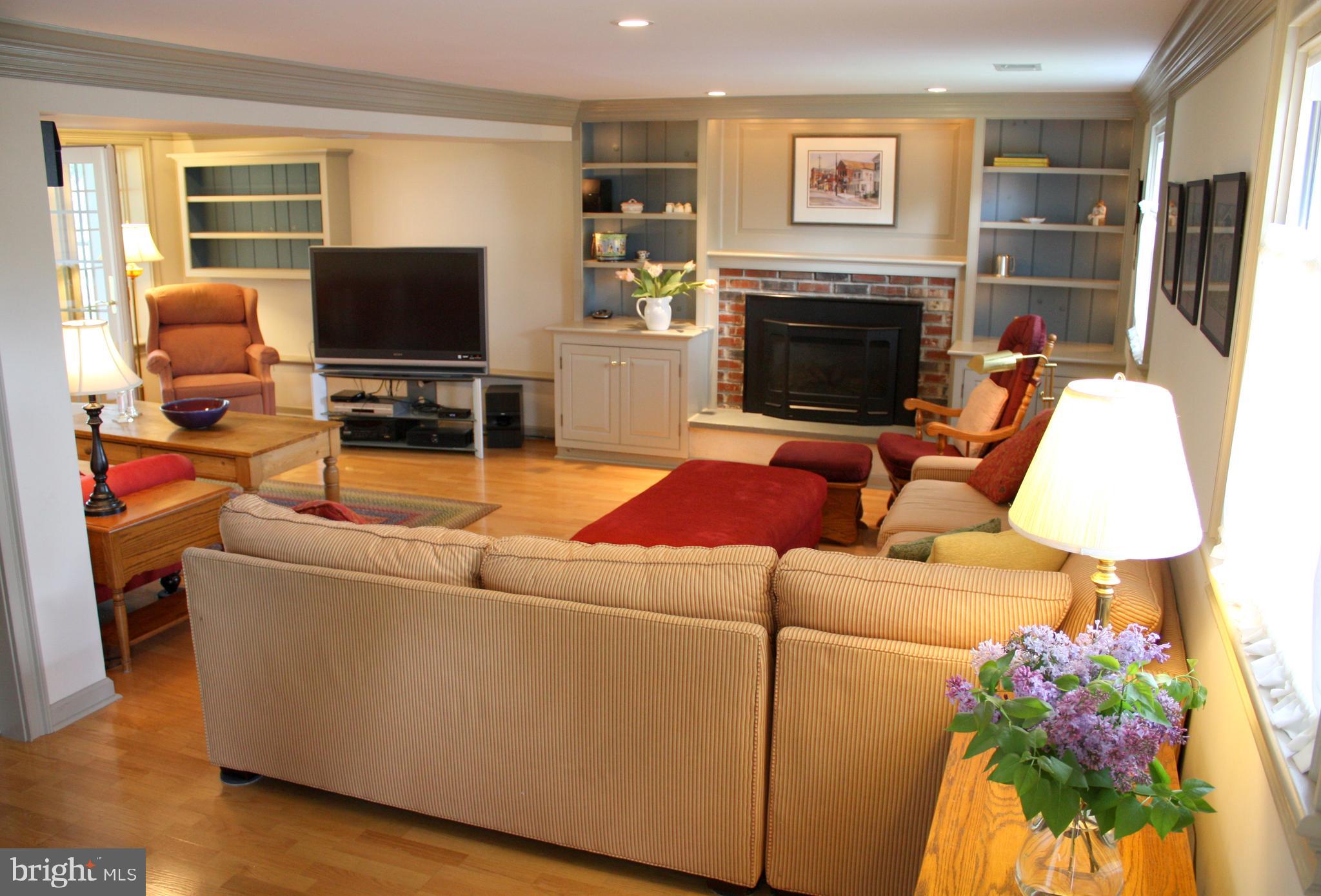 1132 Banes Road Southampton, PA 18966 - Photo 2 of 25 Lower level family room with gas fireplace