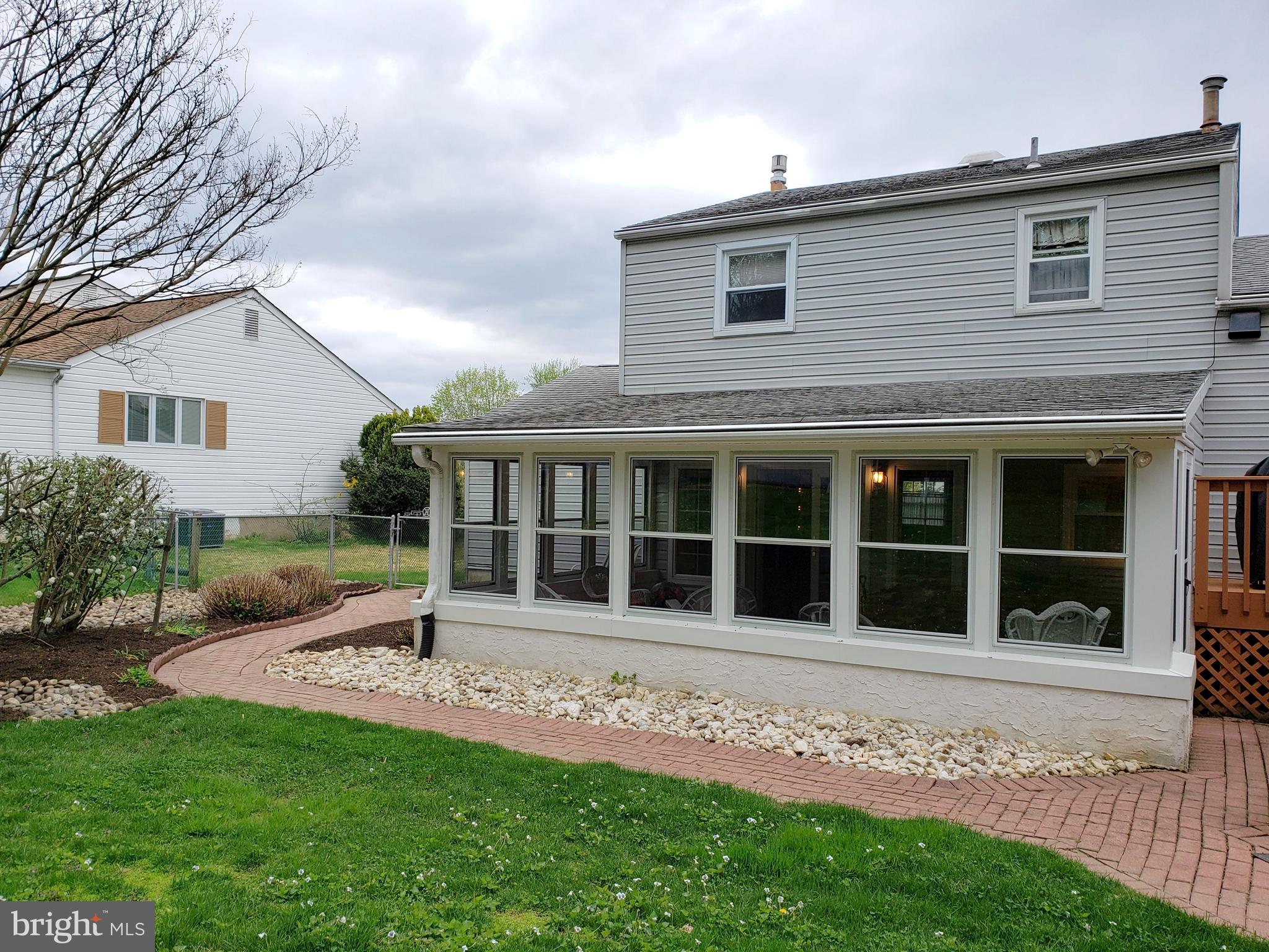 1132 Banes Road Southampton, PA 18966 - Photo 19 of 25 Sunroom and paver walkway