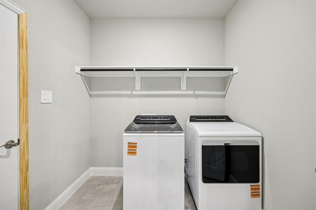 1721 Arches Road Anna, TX 75409 - Photo 21 of 39 a utility room with dryer and washer