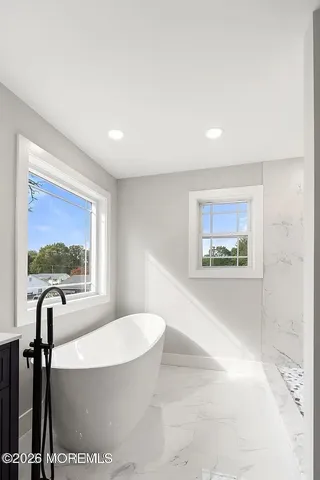 a view of a bathtub in a room