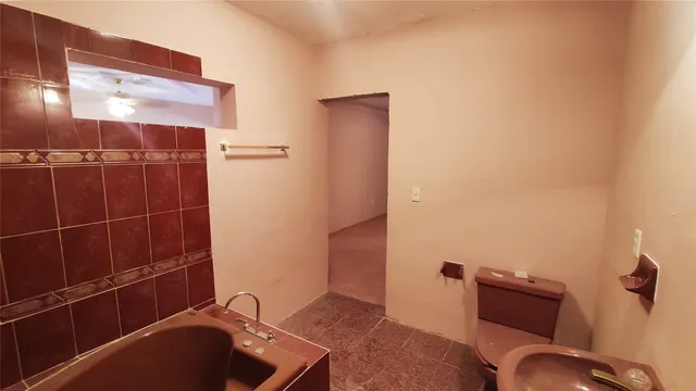 a bathroom with a sink and a tub