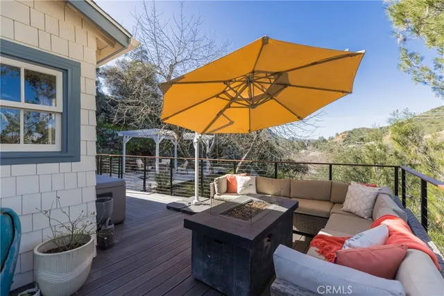 a view of a couches on the roof deck