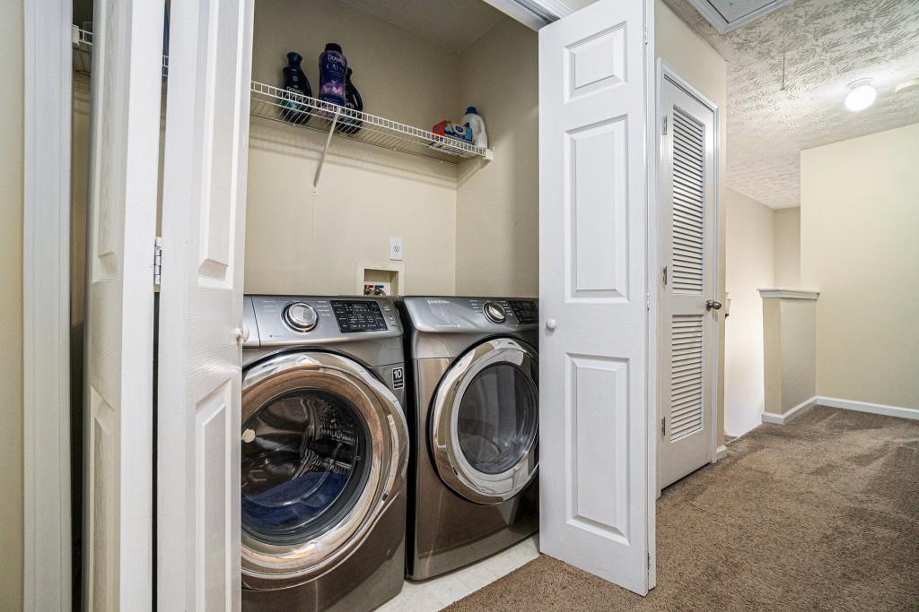 771 Nehemiah Lane Atlanta, GA 30331 - Photo 26 of 30 a utility room with dryer and washer