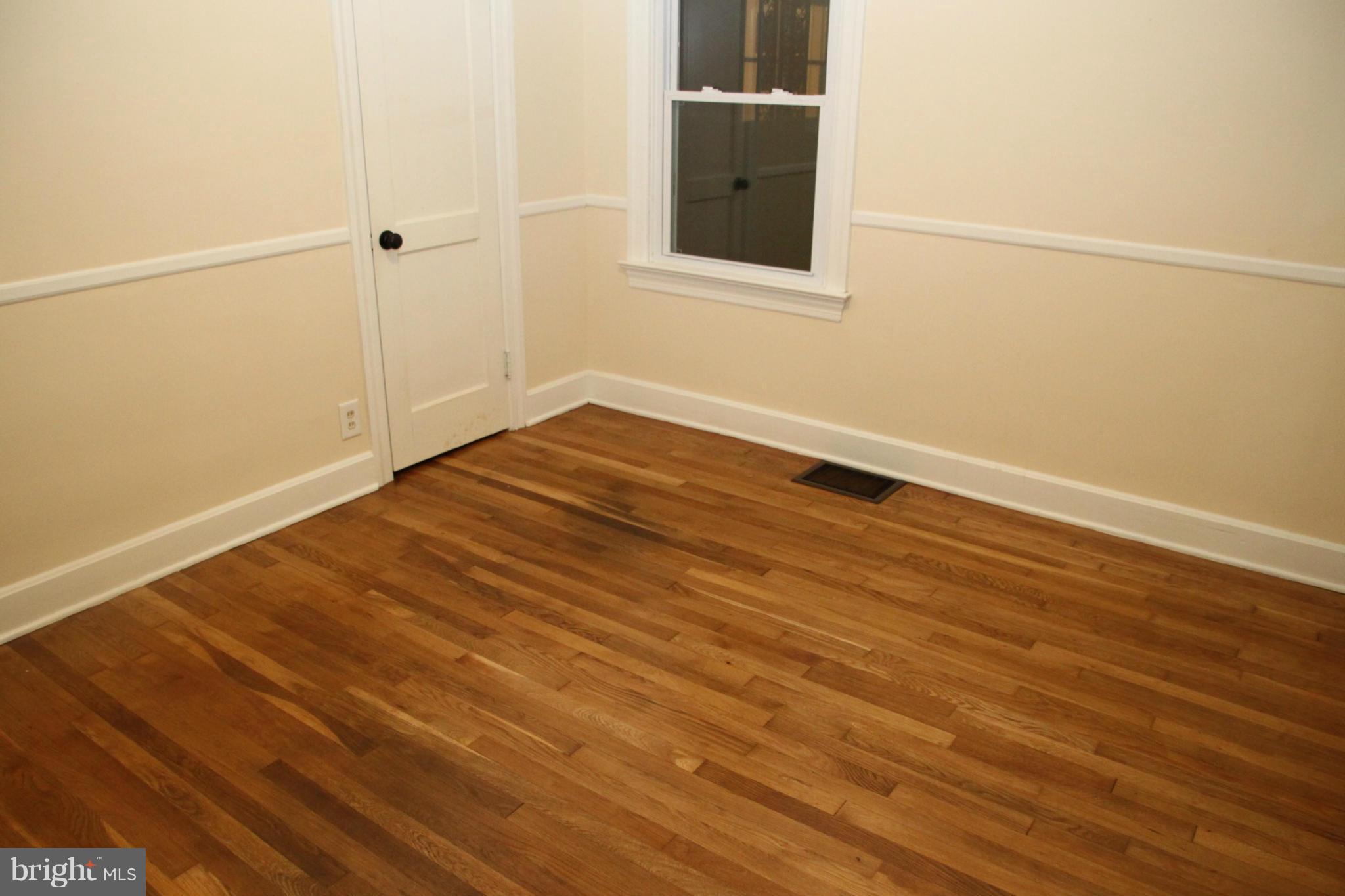 12409 Big Spring Road Clear Spring, MD 21722 - Photo 12 of 20 a view of empty room with wooden floor