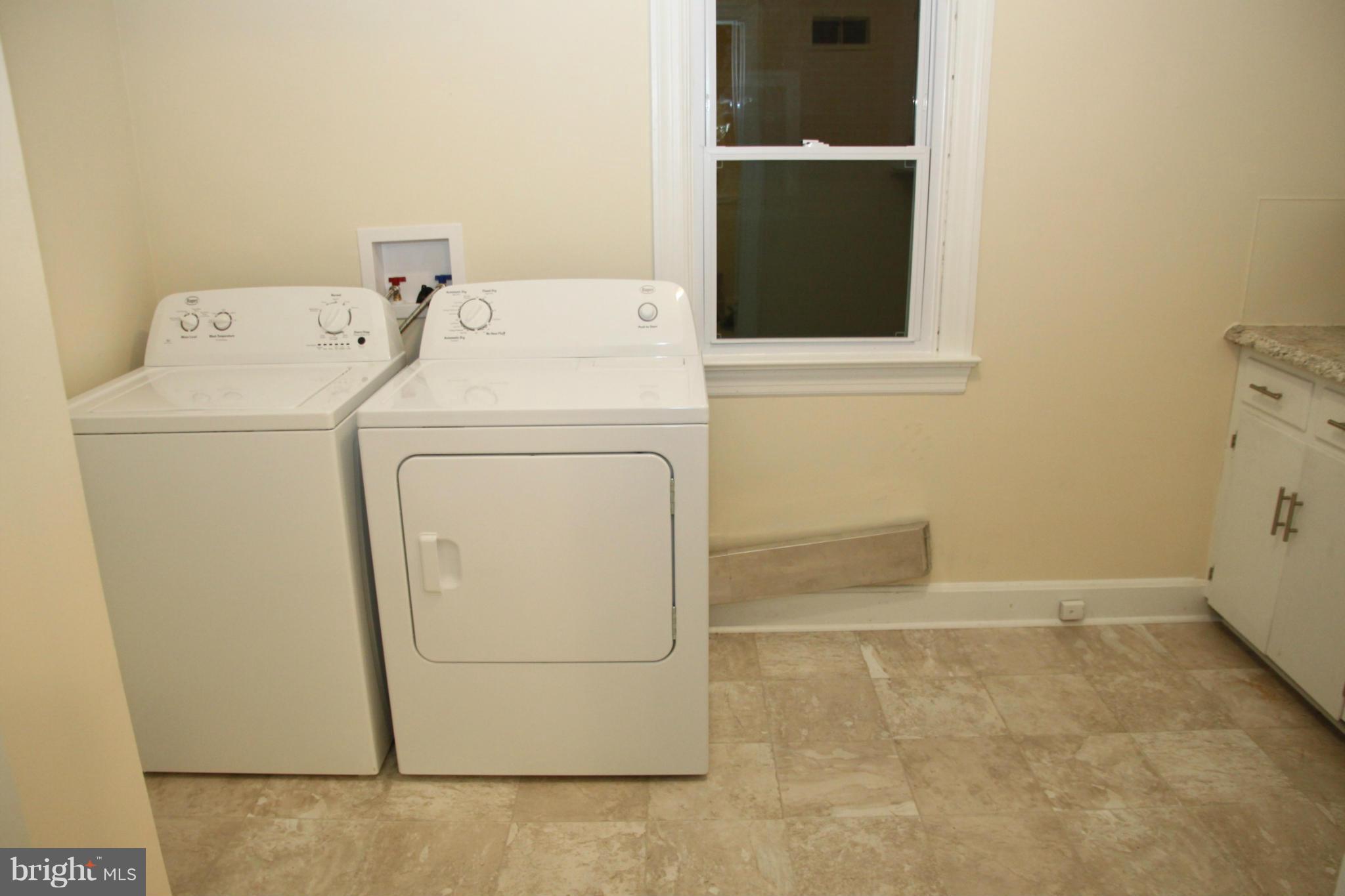 12409 Big Spring Road Clear Spring, MD 21722 - Photo 6 of 20 a utility room with dryer and washer