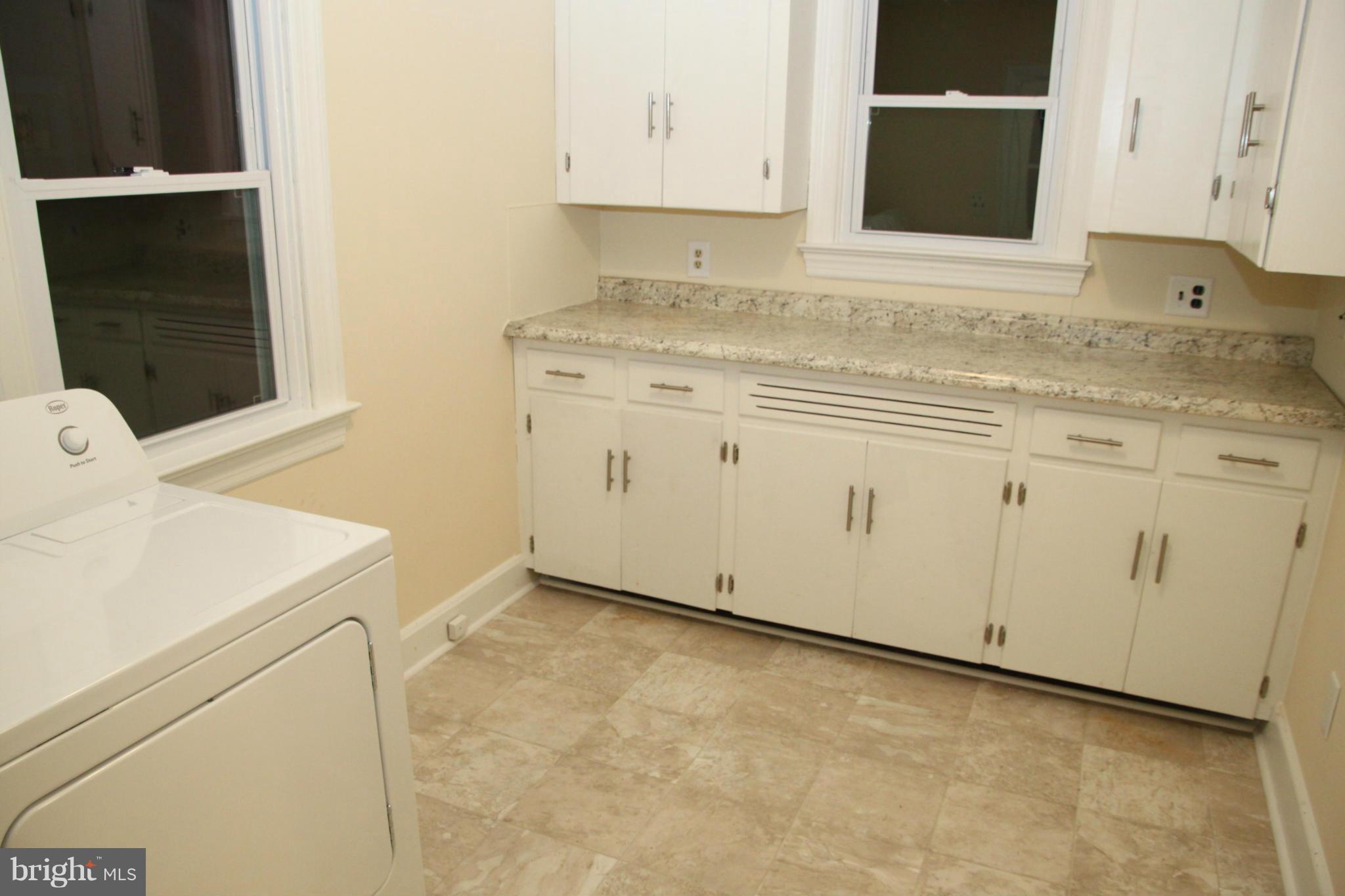 12409 Big Spring Road Clear Spring, MD 21722 - Photo 7 of 20 a view of a kitchen with a sink