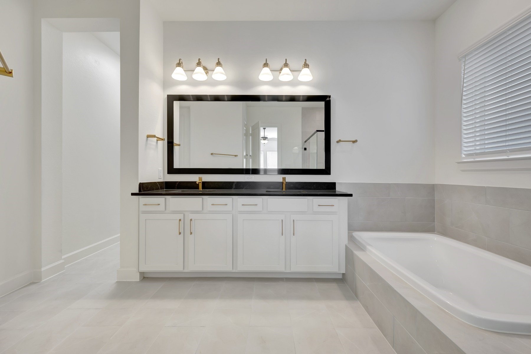 5127 Benton Wds Trail Rosenberg, TX 77471 - Photo 36 of 50 a bathroom with a sink and a mirror