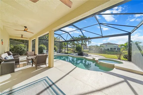 a view of a swimming pool with a patio