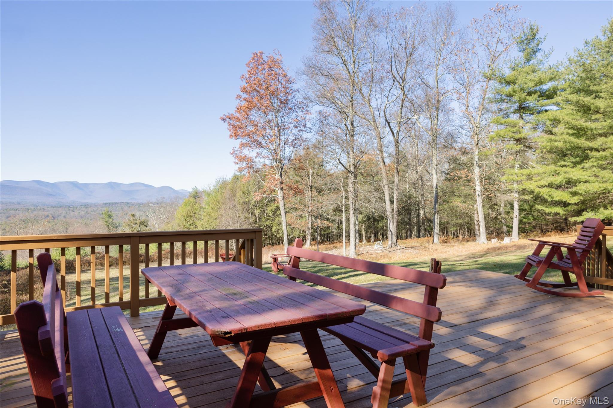 827 Ashokan Road Kingston, NY 12401 - Photo 25 of 36 a view of a chairs and table on the deck