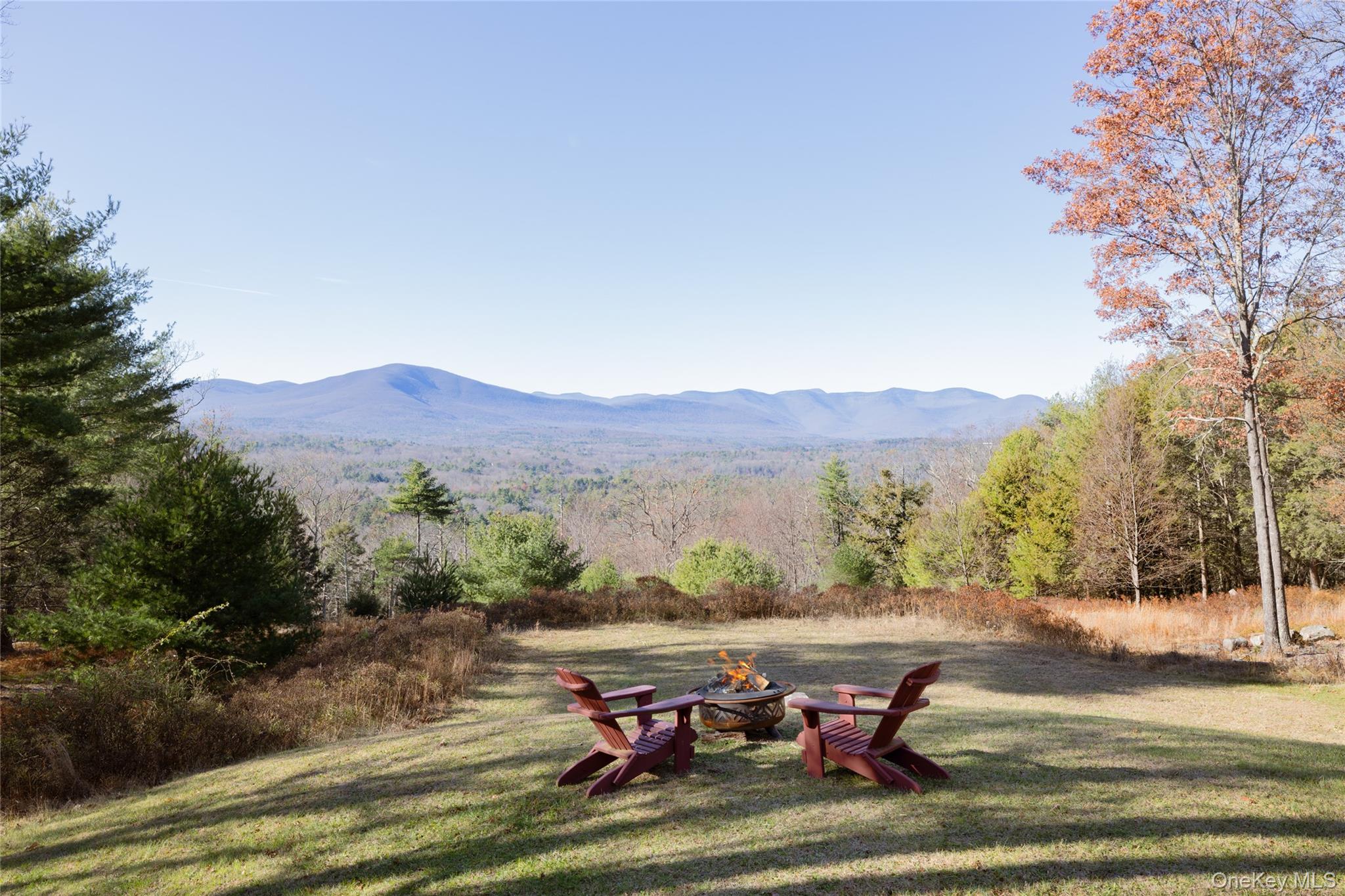 827 Ashokan Road Kingston, NY 12401 - Photo 3 of 36 a view of a lake with a mountain in the background