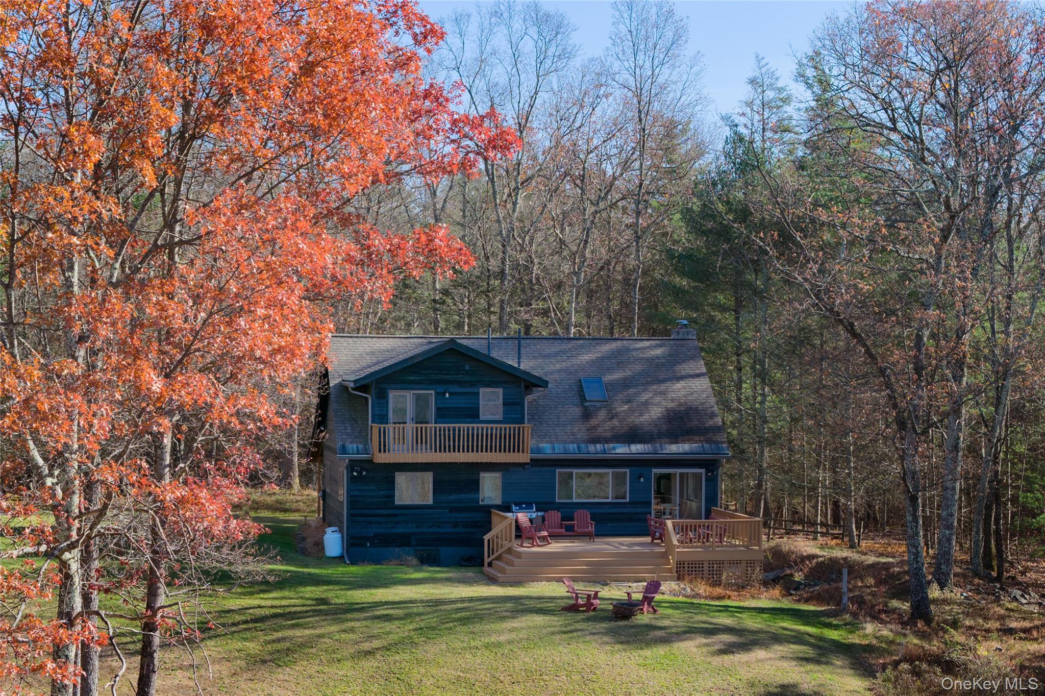 827 Ashokan Road Kingston, NY 12401 - Photo 32 of 36 a front view of house with yard green space and fountain in the background