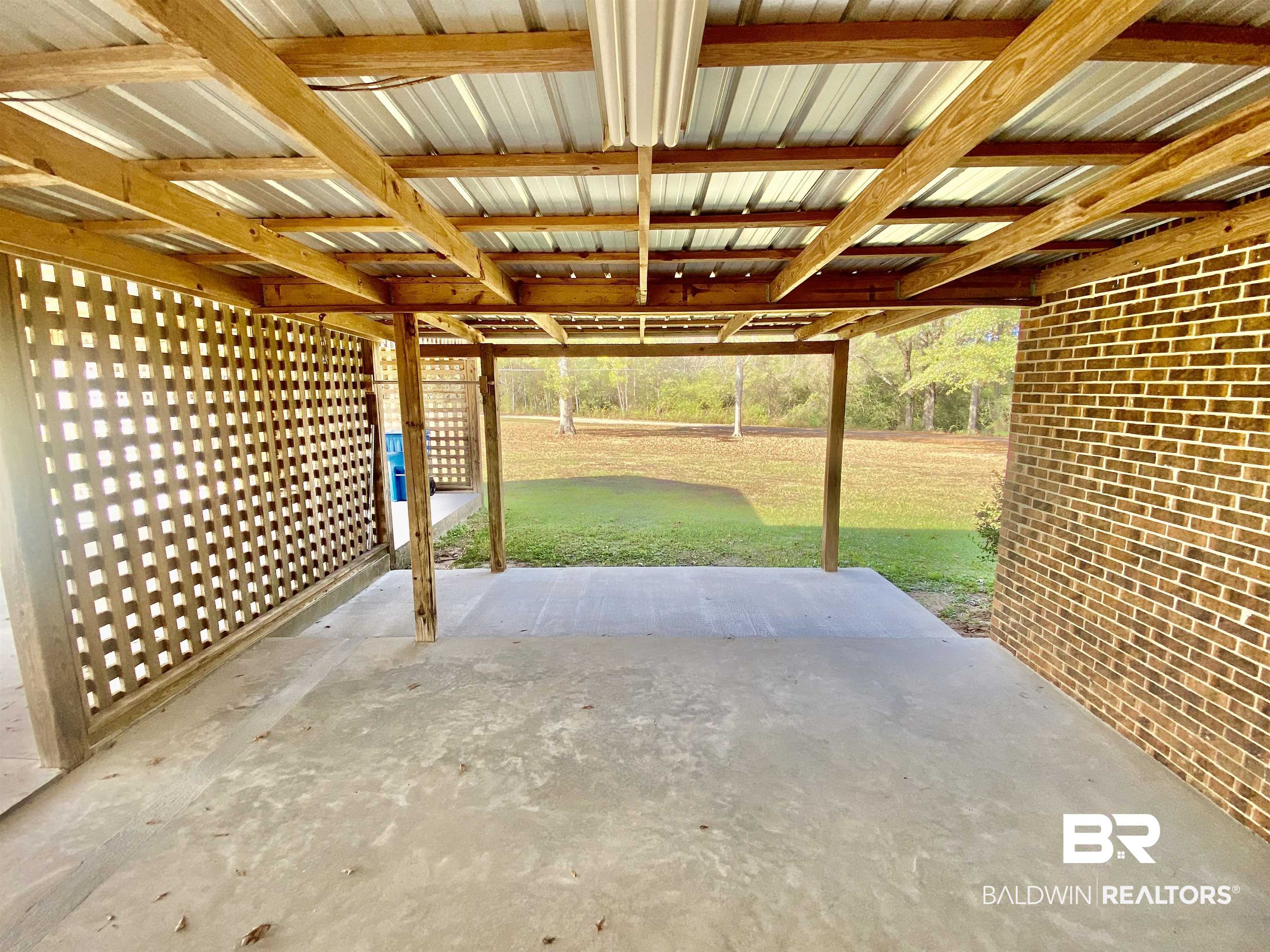 265 Azalea Drive Monroeville, AL 36460 - Photo 31 of 39 View of patio
