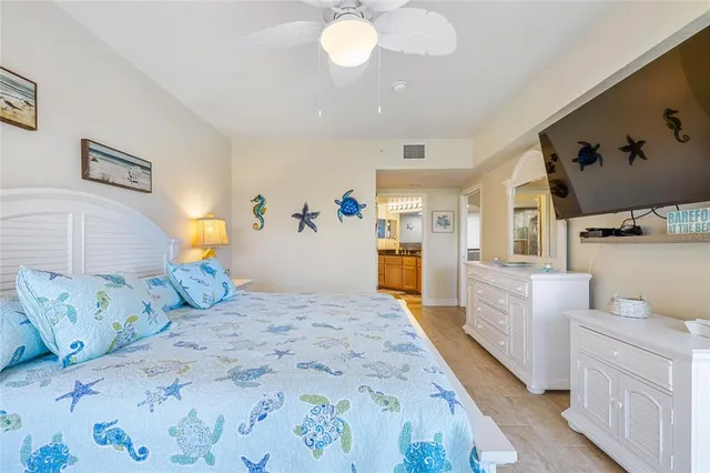 a bedroom with furniture and a couch