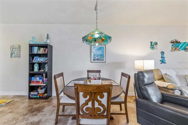 a workspace with furniture and a book shelf