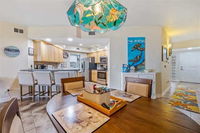 a living room with fireplace furniture and a wooden floor
