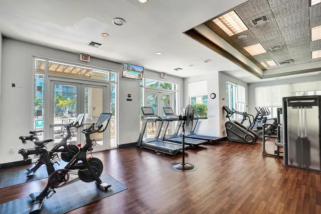 a front view of a house with a garden and patio