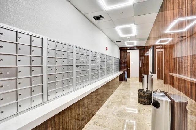 a view of a workspace with furniture