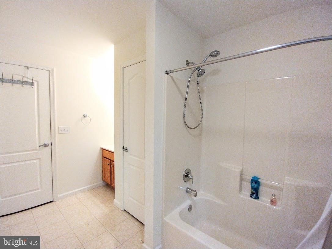 641 Main Washington, NJ 07882 - Photo 11 of 24 a bathroom with a bathtub and a shower