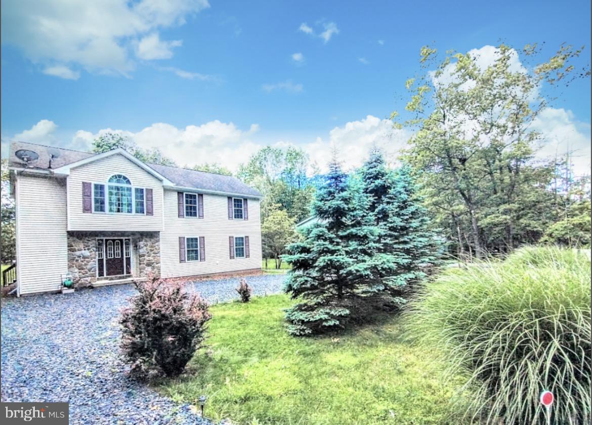 641 Main Washington, NJ 07882 - Photo 2 of 24 a view of a house with a yard and sitting area