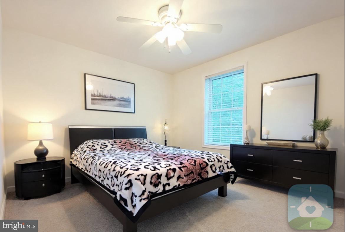 641 Main Washington, NJ 07882 - Photo 8 of 24 a bedroom with a bed and a dresser