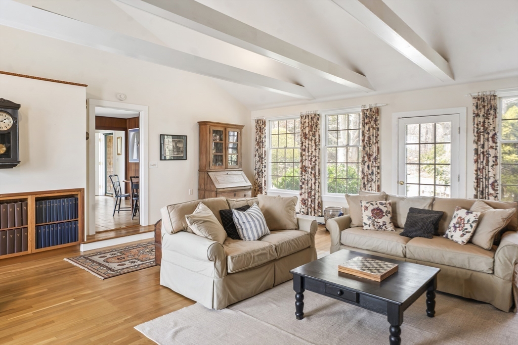 94 Weaver Lane Tisbury, MA 02568 - Photo 15 of 36 a living room with furniture and a large window