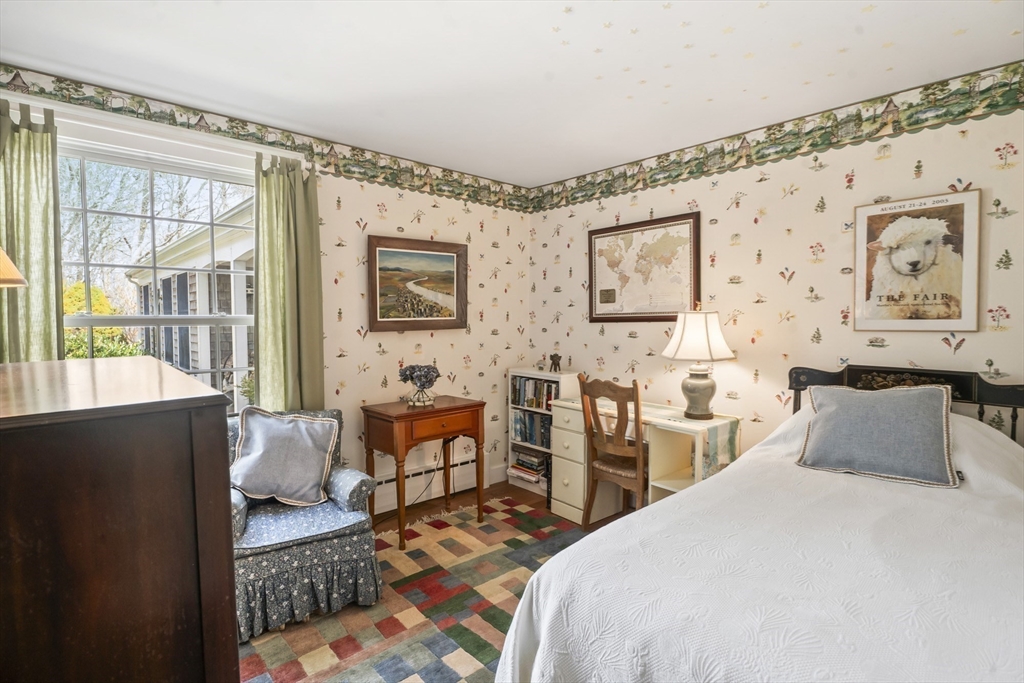 94 Weaver Lane Tisbury, MA 02568 - Photo 29 of 36 a bedroom with furniture and windows
