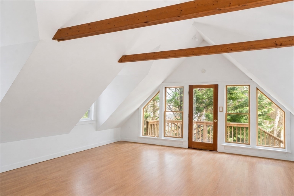 94 Weaver Lane Tisbury, MA 02568 - Photo 32 of 36 an empty room with windows