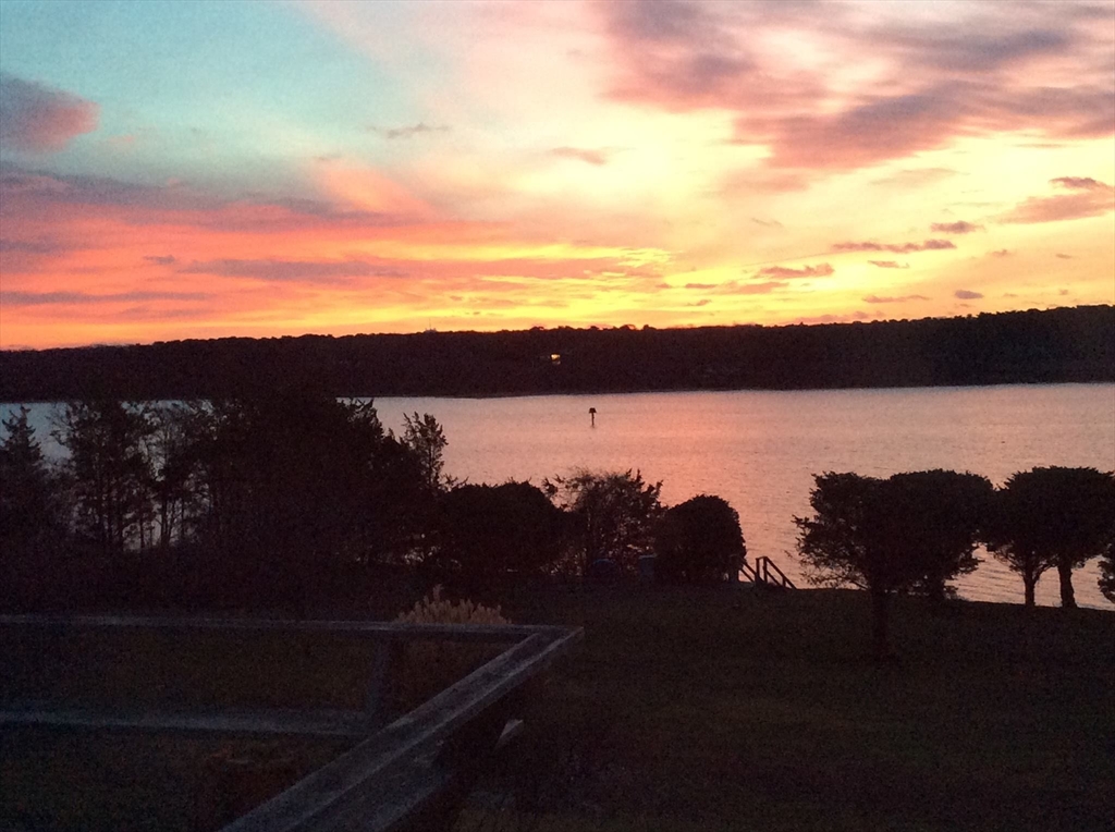 94 Weaver Lane Tisbury, MA 02568 - Photo 36 of 36 a view of a city from a lake