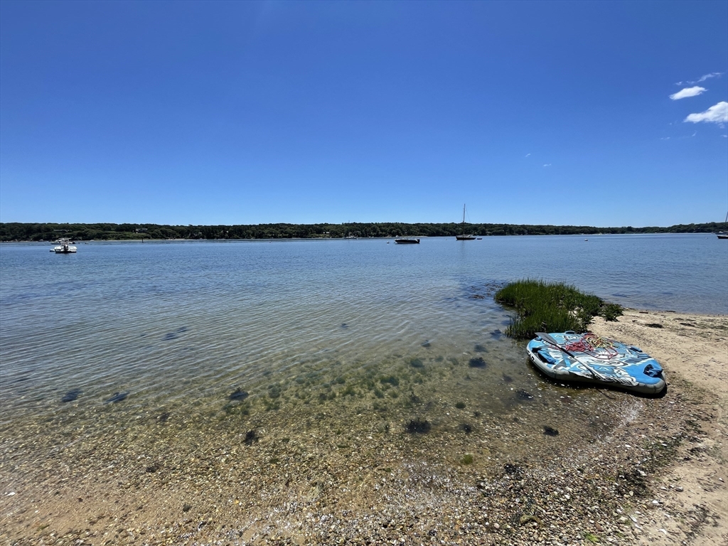 94 Weaver Lane Tisbury, MA 02568 - Photo 7 of 36 a view of a lake with outside space