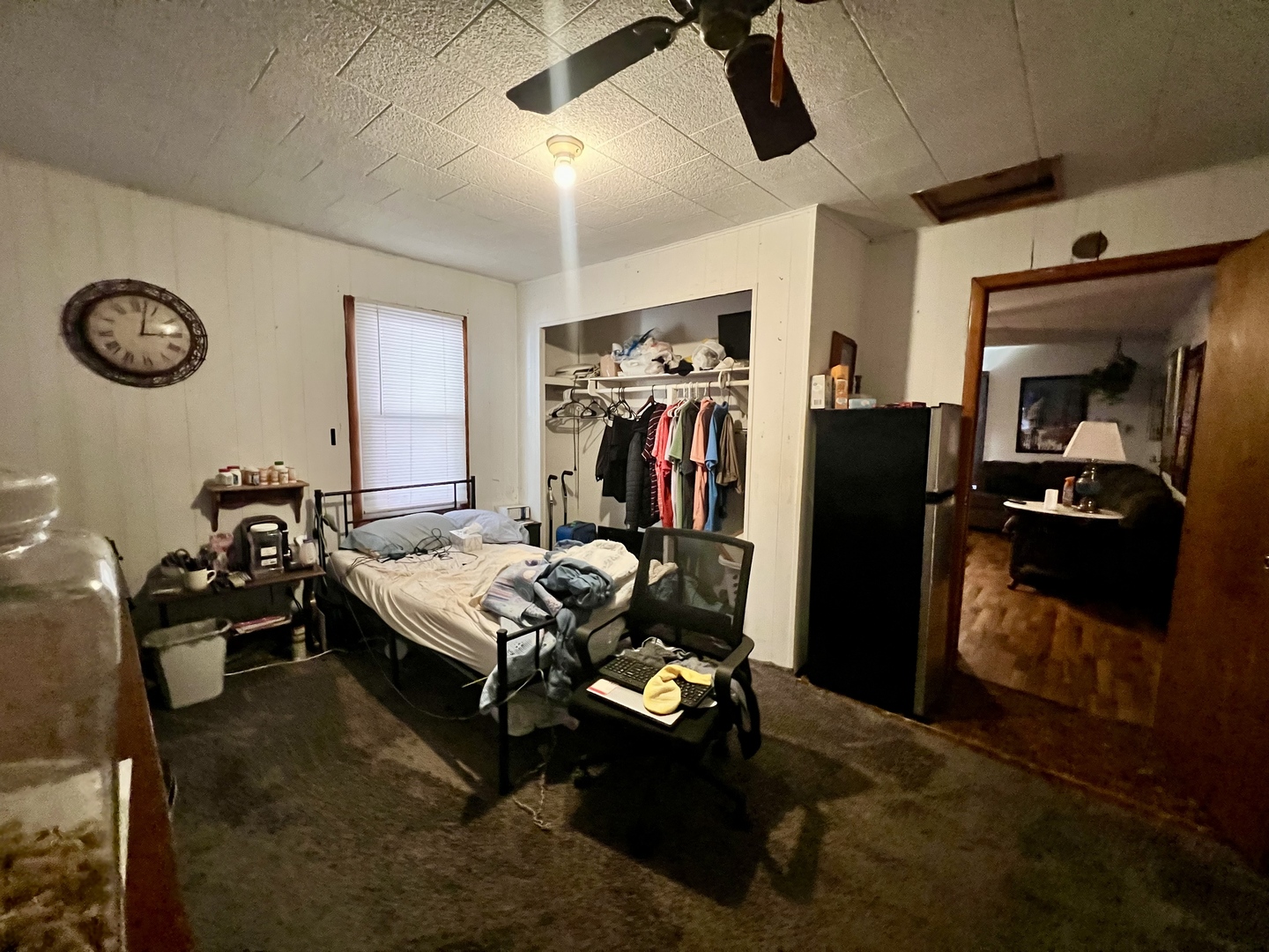 228 Tennessee Avenue Danville, IL 61832 - Photo 13 of 19 a bed room with a bed and a television