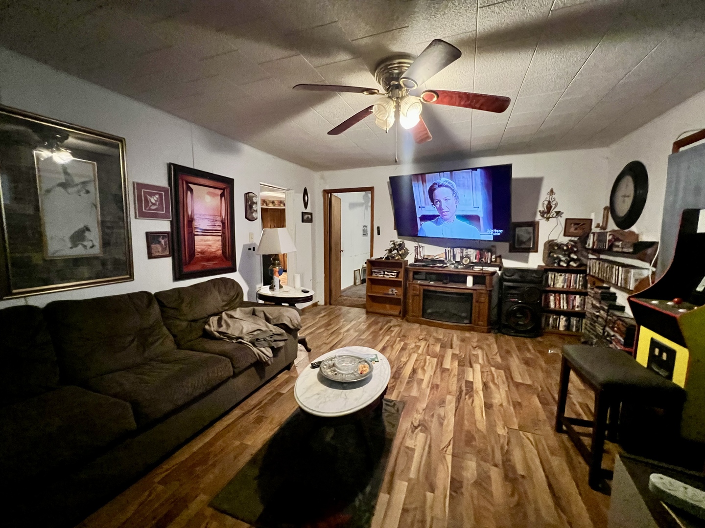 228 Tennessee Avenue Danville, IL 61832 - Photo 5 of 19 a living room with furniture and a flat screen tv