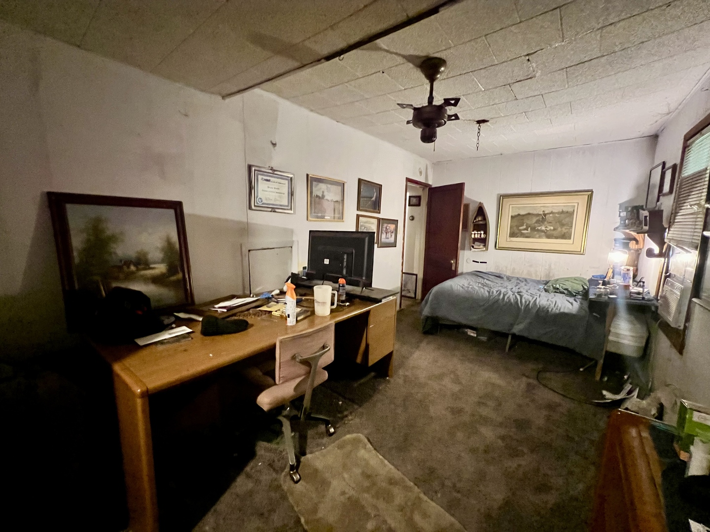 228 Tennessee Avenue Danville, IL 61832 - Photo 9 of 19 a view of a workspace with furniture