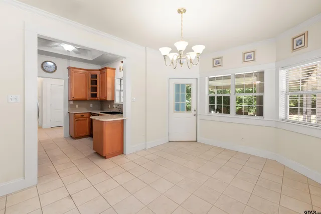 a view of a kitchen with windows