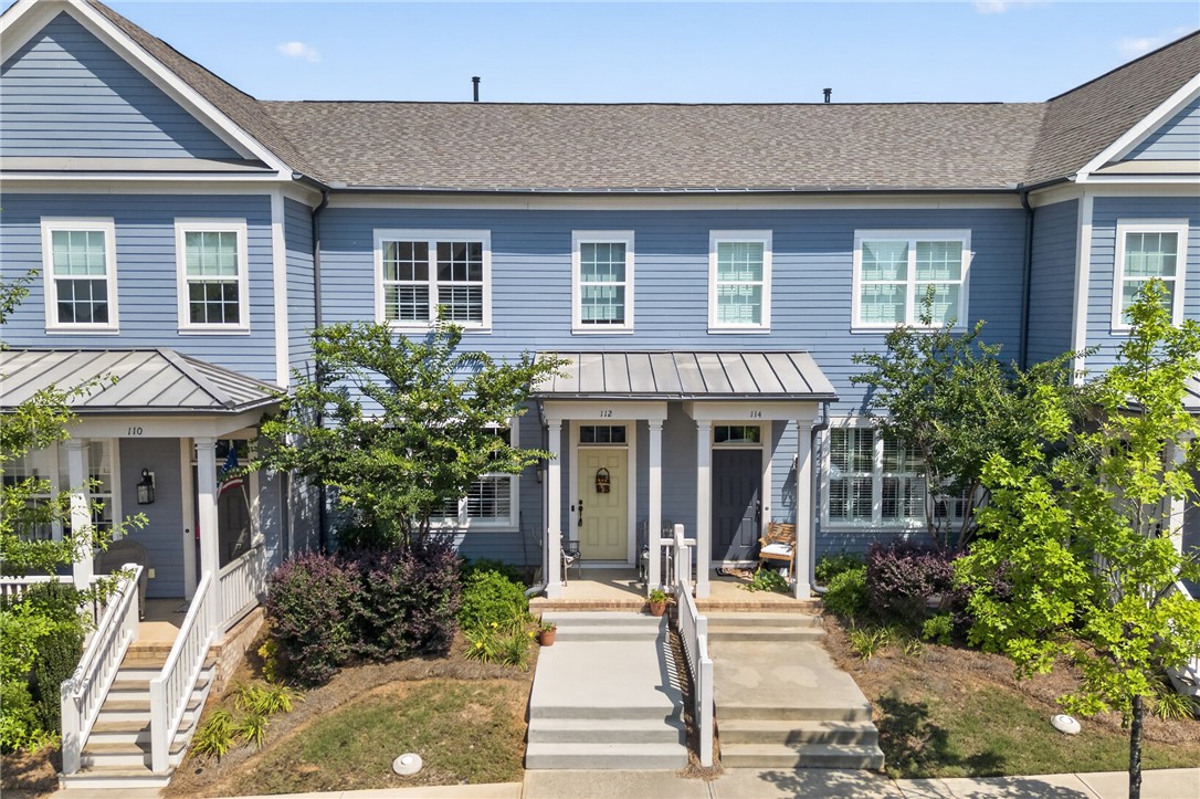 112 Tuttle Street Clemson, SC 29631 - Photo 1 of 46 These charming townhomes feature welcoming entryways with covered porches and lush landscaping.