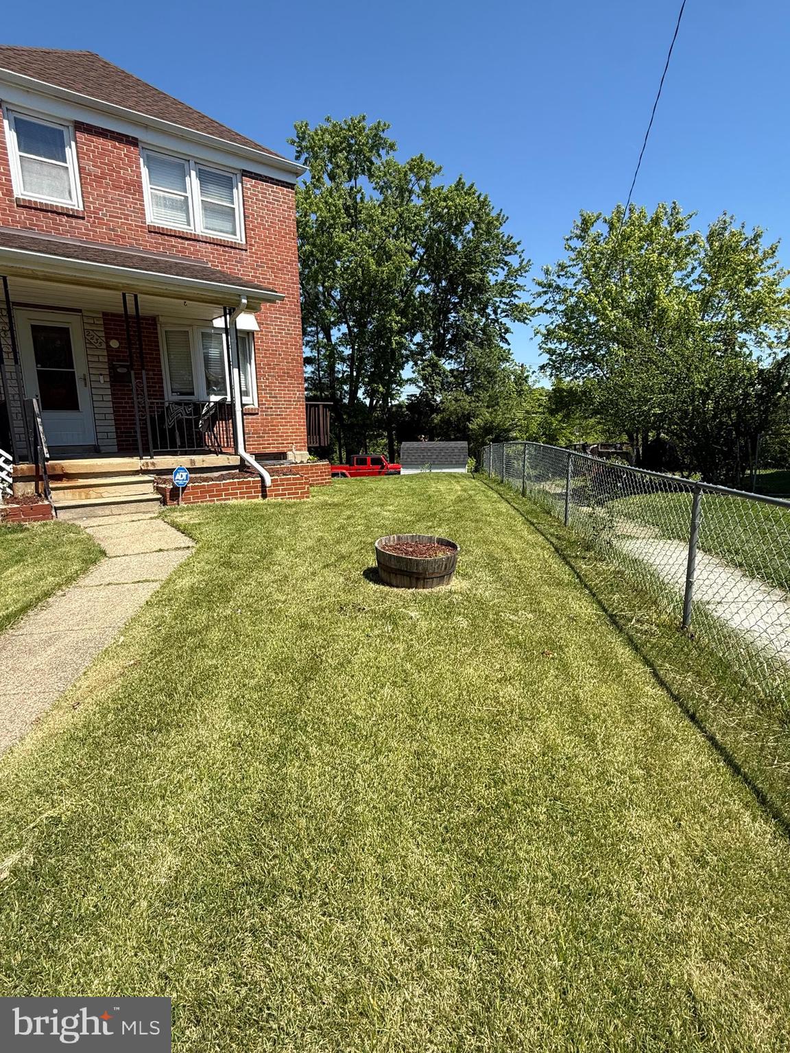 2235 Hawthorne Road Baltimore, MD 21220 - Photo 1 of 35 a view of a house with swimming pool and a yard