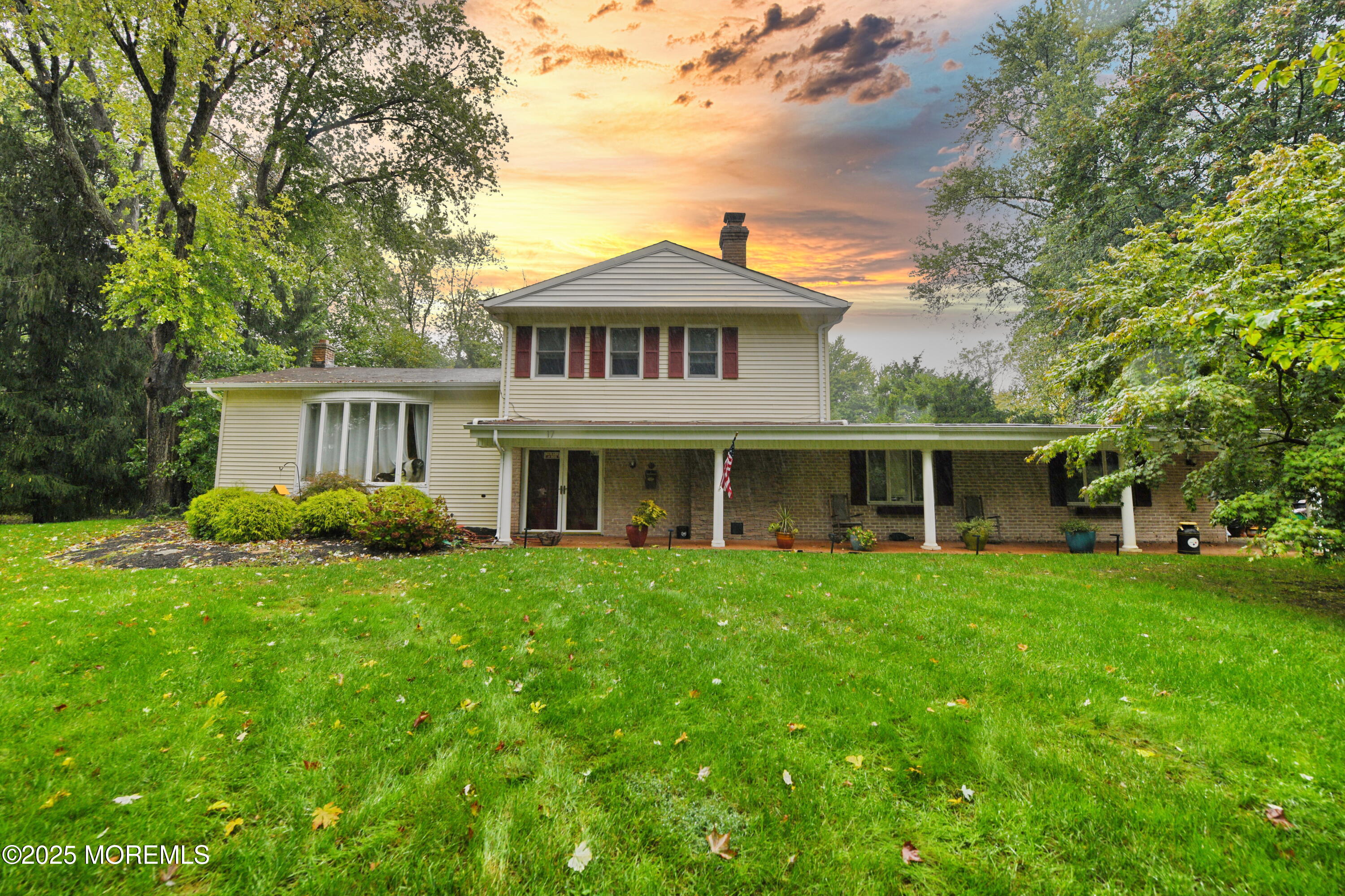 17 High Point Road Lincroft, NJ 07738 - Photo 2 of 39 a front view of a house with a garden