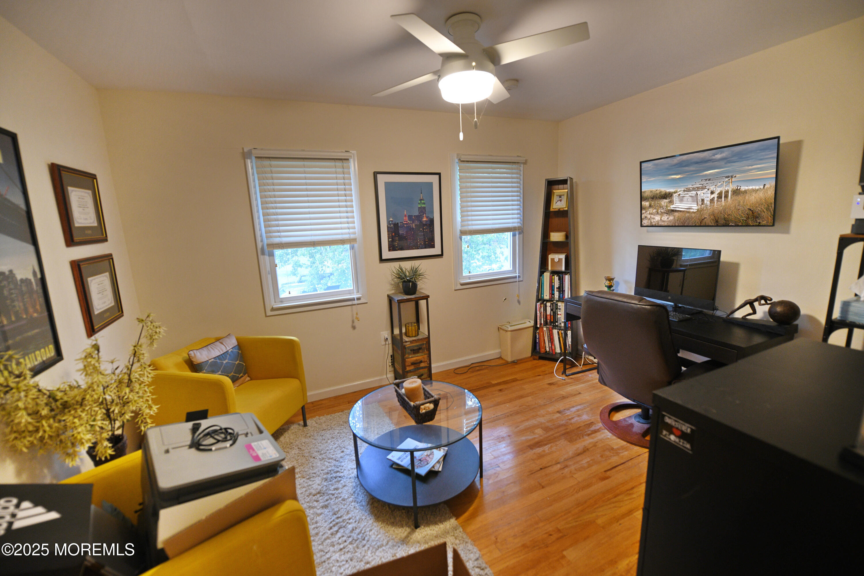 17 High Point Road Lincroft, NJ 07738 - Photo 23 of 39 a living room with furniture and a flat screen tv