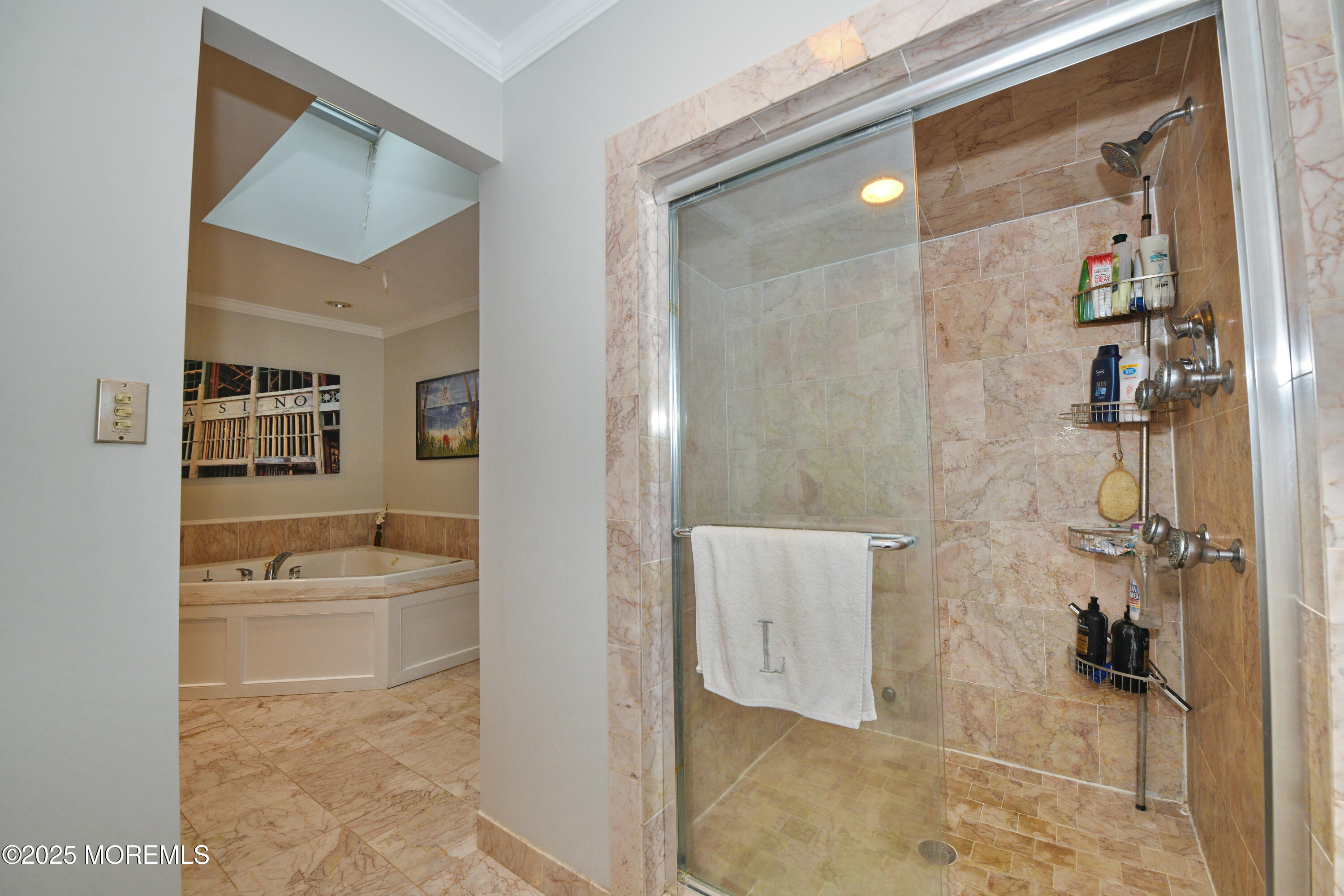 17 High Point Road Lincroft, NJ 07738 - Photo 27 of 39 a bathroom with a tub and a shower