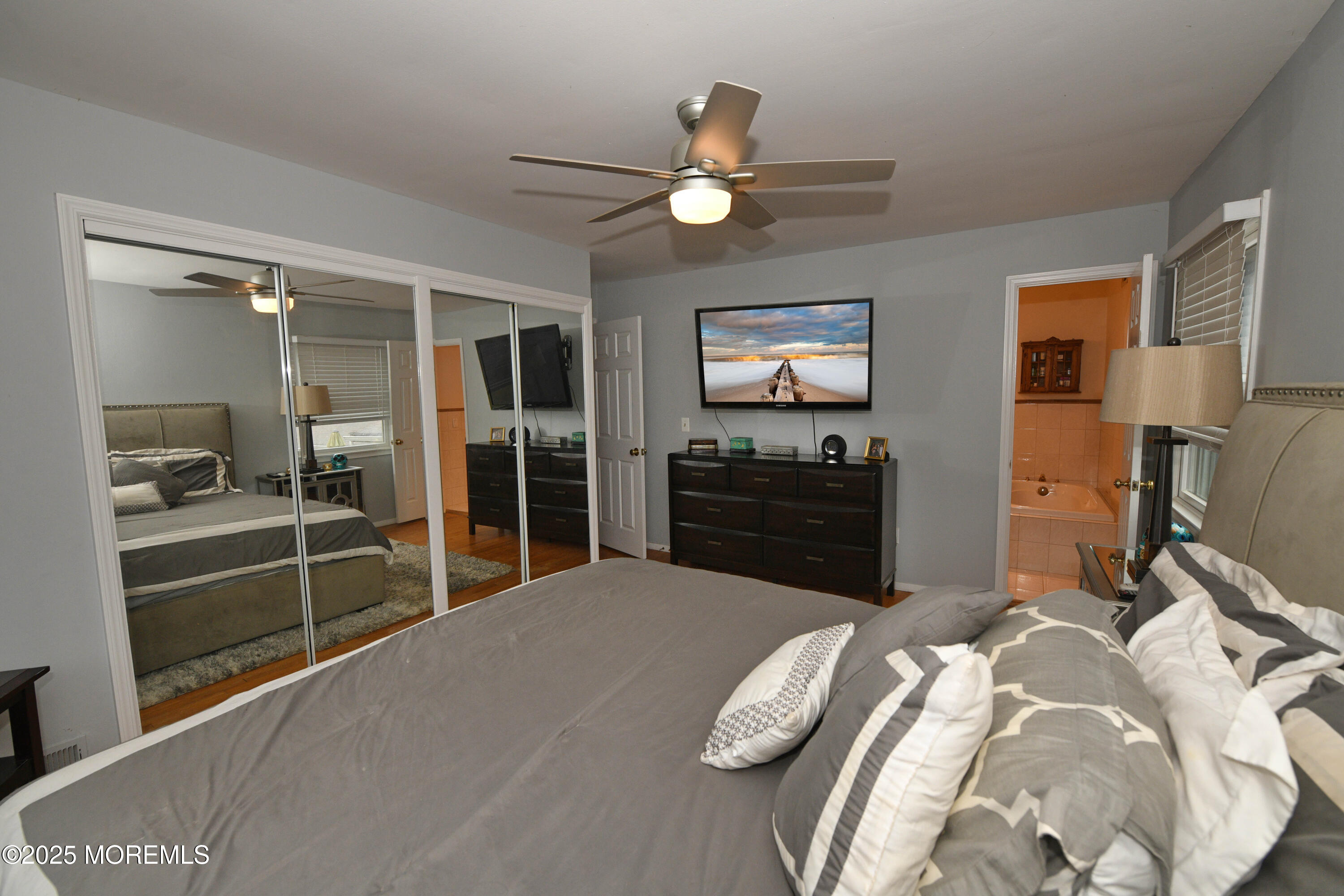 17 High Point Road Lincroft, NJ 07738 - Photo 29 of 39 a bed room with a bed and a television