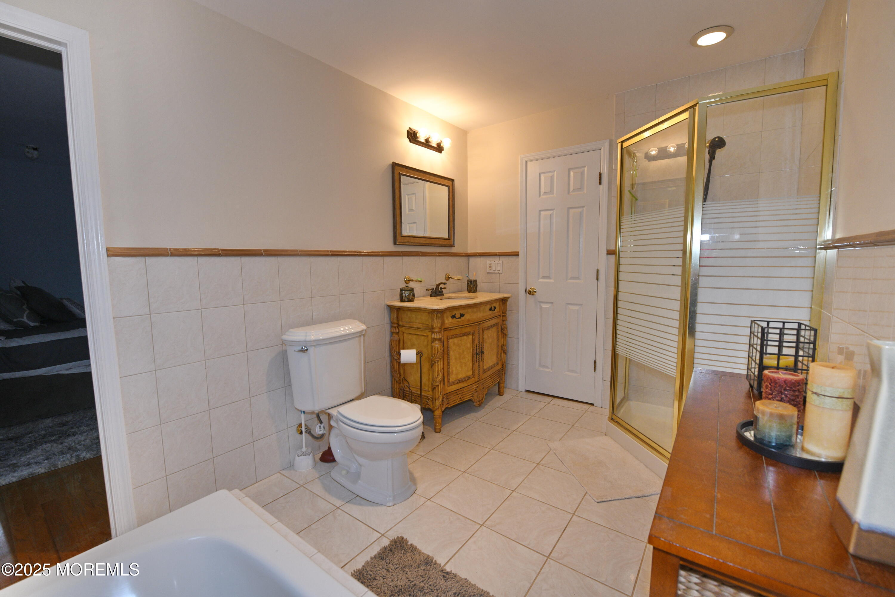 17 High Point Road Lincroft, NJ 07738 - Photo 30 of 39 a bathroom with a sink toilet and shower