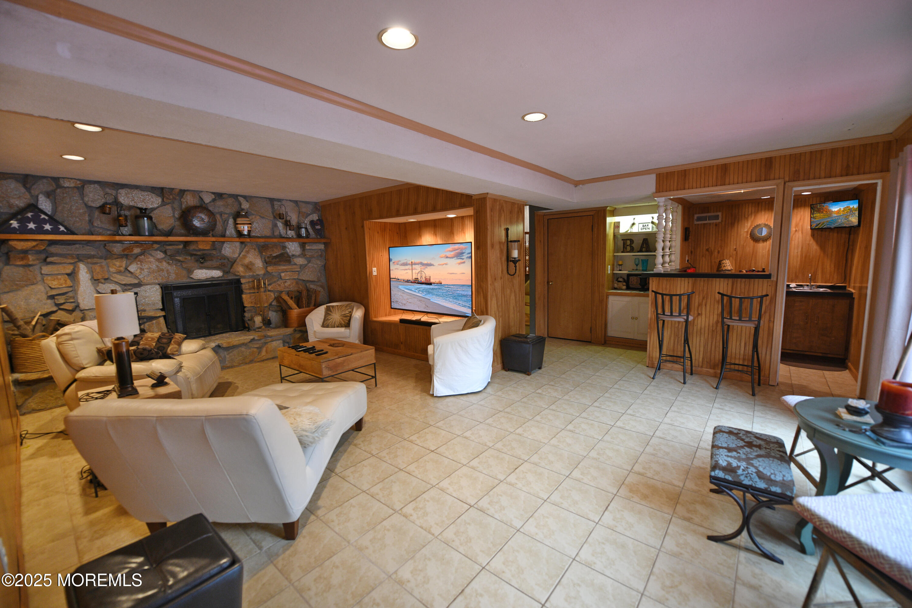 17 High Point Road Lincroft, NJ 07738 - Photo 34 of 39 a living room with furniture a large window and stainless steel appliances