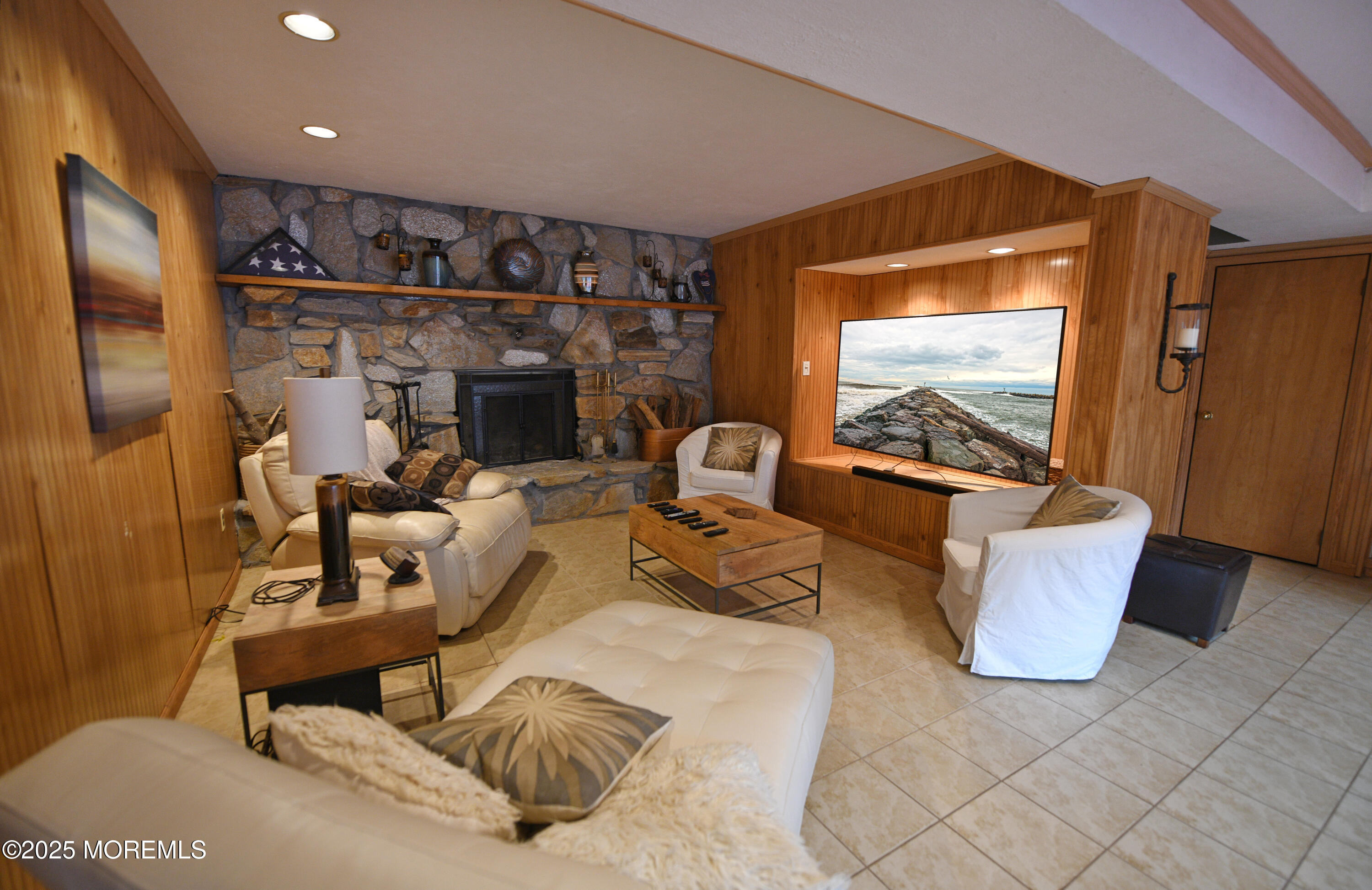 17 High Point Road Lincroft, NJ 07738 - Photo 35 of 39 a living room with furniture and a flat screen tv