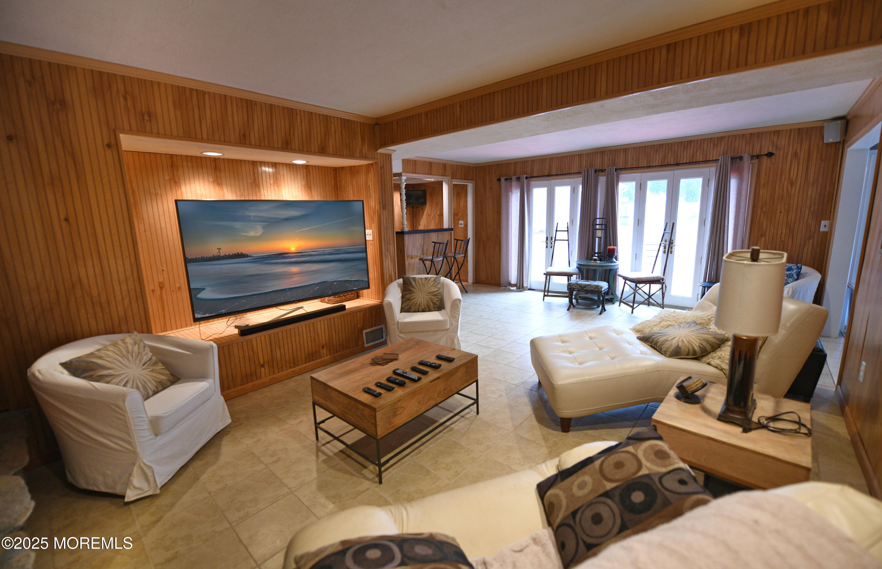 17 High Point Road Lincroft, NJ 07738 - Photo 36 of 39 a living room with furniture and a flat screen tv