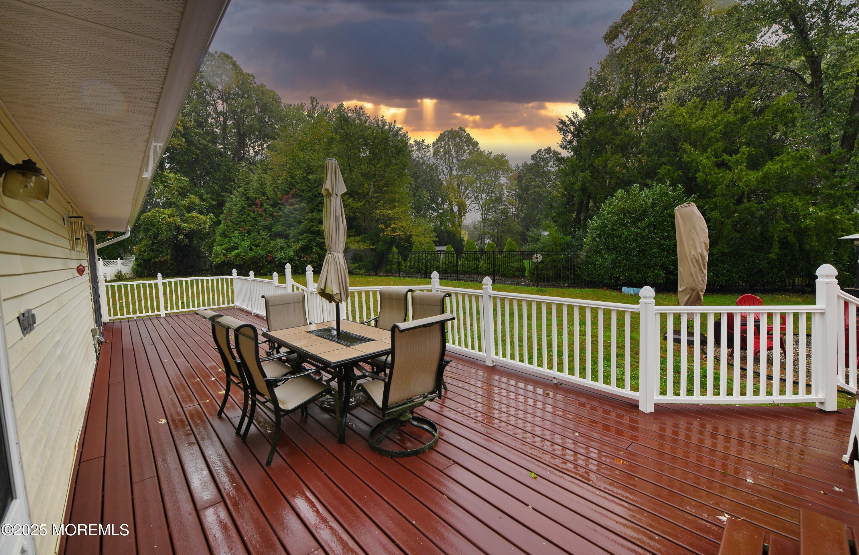 17 High Point Road Lincroft, NJ 07738 - Photo 9 of 39 a view of a deck with wooden floor and outdoor seating